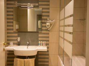 Koupelna v ubytování Eracle Hotel