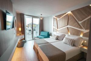 Posteľ alebo postele v izbe v ubytovaní The Ibiza Twiins - 4* Sup