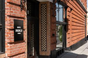 a door to a brick building with a sign on it at Hotel Indigo Spokane Downtown, an IHG Hotel in Spokane