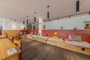Restaurant o un lloc per menjar a Enshi Grand Canyon Yutan Muyun Guesthouse