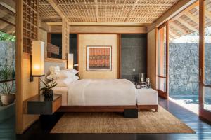 Ein Bett oder Betten in einem Zimmer der Unterkunft The Datai Langkawi