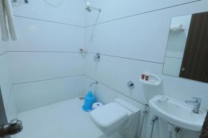 Ванная комната в Vishal Lords Inn Gir Forest