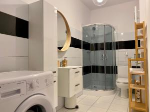 Kúpeľňa v ubytovaní apartament Hrabala + 24 fotografií