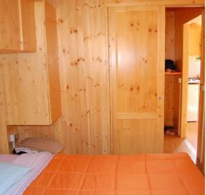En eller flere senge i et værelse på Campeggio Punta di Crabbia