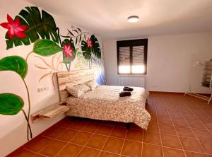 A bed or beds in a room at Las Casetas de Mateu