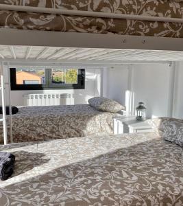 A bed or beds in a room at Las Casetas de Mateu