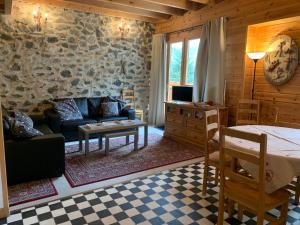 Posezení v ubytování Ferme Noemie (Bourg d'Oisans)