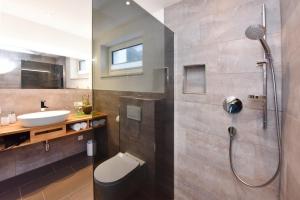 Koupelna v ubytování Ferienwohnung Saxenhammer + 37 fotografií