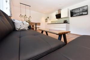 Posezení v ubytování Ferienwohnung Saxenhammer