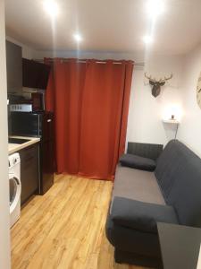 Kuchyň nebo kuchyňský kout v ubytování Le 211,ski et randonnée, WIFI, lave linge , ascenceur,parking gratuit + 29 fotografií