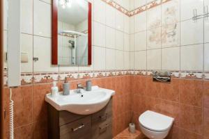 Kúpeľňa v ubytovaní Apartamenty Rodzinne II ApartZakop