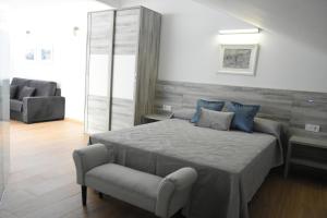 Postel nebo postele na pokoji v ubytování Ardales Loft