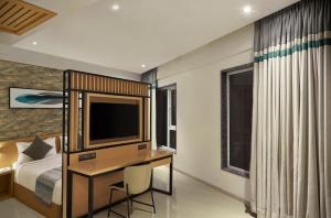 Letto o letti in una camera di Click Hotel Bangalore - International Airport