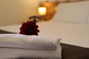 Letto o letti in una camera di Hotel Castel Miramonti