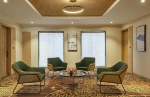 Area soggiorno di Click Hotel Bangalore - International Airport