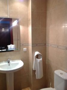 Łazienka w obiekcie Hostal Los Amigos