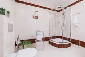 Kúpeľňa v ubytovaní Apartament Szarotka Kierpcówka 16 Kościelisko by Noclegi Renters