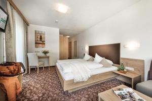 Ένα ή περισσότερα κρεβάτια σε δωμάτιο στο Hotel Puint