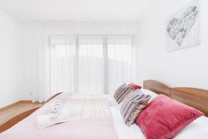 Posteľ alebo postele v izbe v ubytovaní Apartament Szarotka Kierpcówka 16 Kościelisko by Noclegi Renters