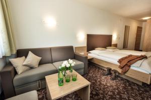 Ένα ή περισσότερα κρεβάτια σε δωμάτιο στο Hotel Puint