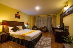 Postel nebo postele na pokoji v ubytování Hotel The Kantipur