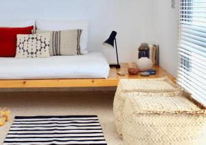 Krevet ili kreveti u jedinici u okviru objekta Beach hideaway apartment with modernist design