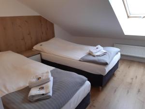 Łóżko lub łóżka w pokoju w obiekcie SZWEDZKA22 PL Premium Rooms