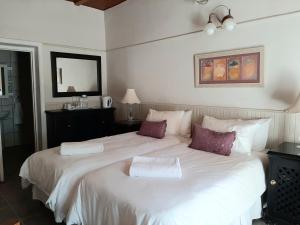 Letto o letti in una camera di De Graaff Manor