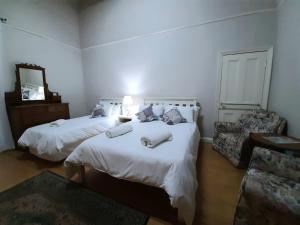 Letto o letti in una camera di De Graaff Manor