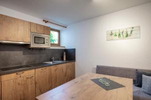 A kitchen or kitchenette at Vizensn Living