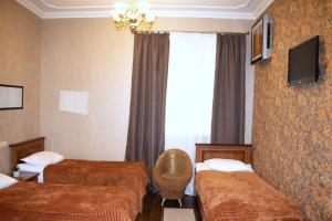 Postel nebo postele na pokoji v ubytování Bogdanov Yar Hotel