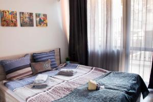 Postel nebo postele na pokoji v ubytování Vera by RV Apartments