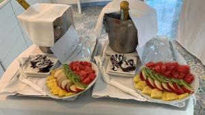 a table with three plates of different types of food at Relais Maresca Luxury Small Hotel & Terrace Restaurant in Capri