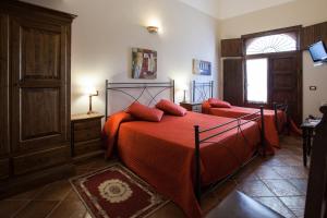 Posteľ alebo postele v izbe v ubytovaní B&B Cinisi Vacanze