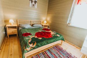 Postel nebo postele na pokoji v ubytování Kempings Kalnavoti