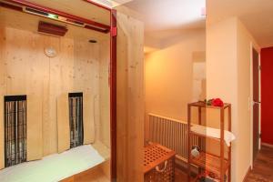 A bed or beds in a room at Ferienhaus Resi & Obermoser