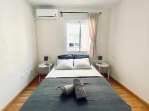 Posteľ alebo postele v izbe v ubytovaní GMC Turistics - The Picasso Neighborhood House