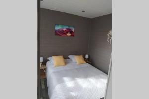 Ένα ή περισσότερα κρεβάτια σε δωμάτιο στο Tiny house