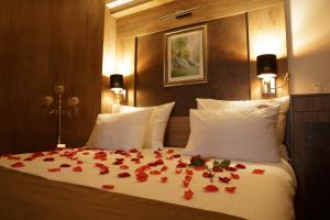 Voodi või voodid majutusasutuse Hotel Vrbak ND toas
