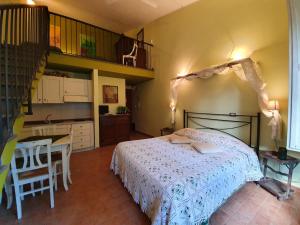 A bed or beds in a room at Bio Agriturismo Valle dei Calanchi