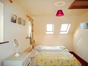 Giường trong phòng chung tại Allaghee Mor St Finians Bay