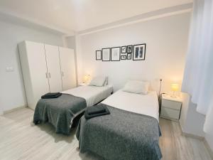 Posteľ alebo postele v izbe v ubytovaní GMC Turistics - La Casita de Atarazanas