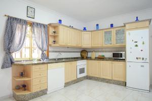 Kuchyň nebo kuchyňský kout v ubytování Casa Noni