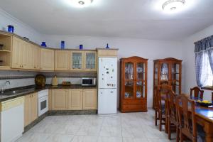 Kuchyň nebo kuchyňský kout v ubytování Casa Noni