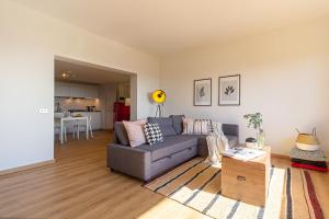 Posezení v ubytování Spacious Apartment with Garden & Air Conditioning - La Grande Finestra + 24 fotografií