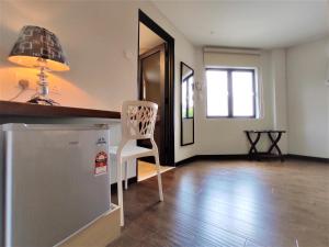 Kuchyň nebo kuchyňský kout v ubytování Apple Suites Hotel