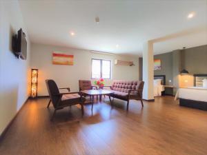 Posezení v ubytování Apple Suites Hotel