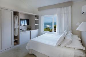 Voodi või voodid majutusasutuse Abracadabra Boutique Hotel toas