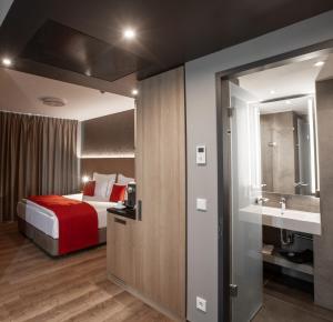 Postel nebo postele na pokoji v ubytování Ocak Hotel