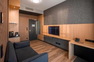 TV a/nebo společenská místnost v ubytování Ocak Hotel